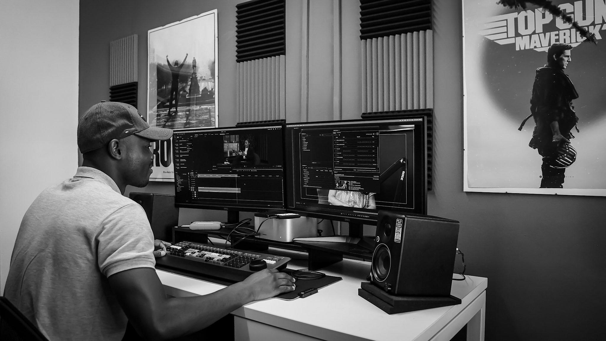 A Calzado Media creative working in a professional editing studio